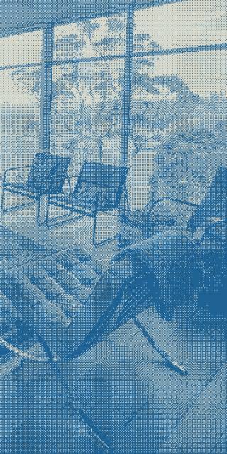 Seats are arranged for conversation and vista gazing in the loungeroom.